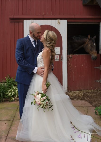 Couple with Horse in Barn