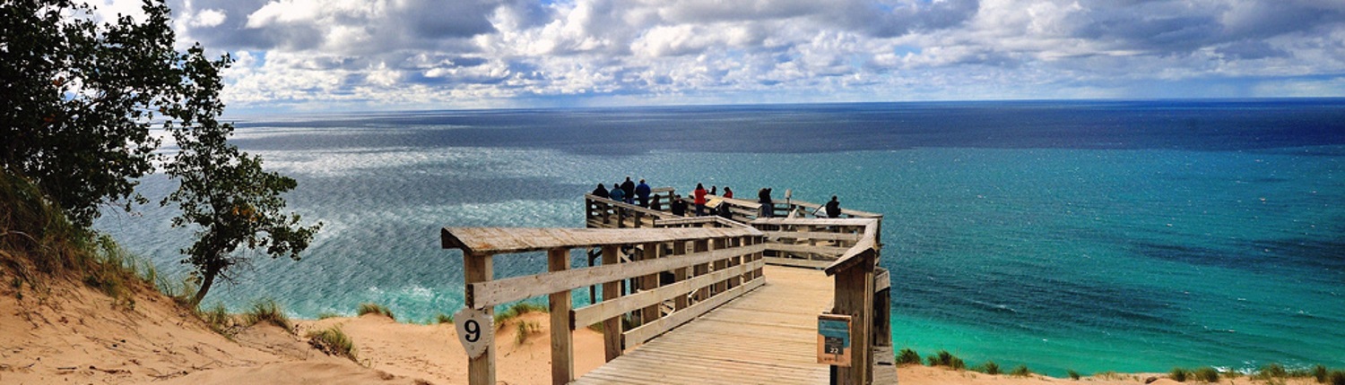 People enjoying views of Lake Michigan at the Sleeping Bear Dunes National Lakeshore.