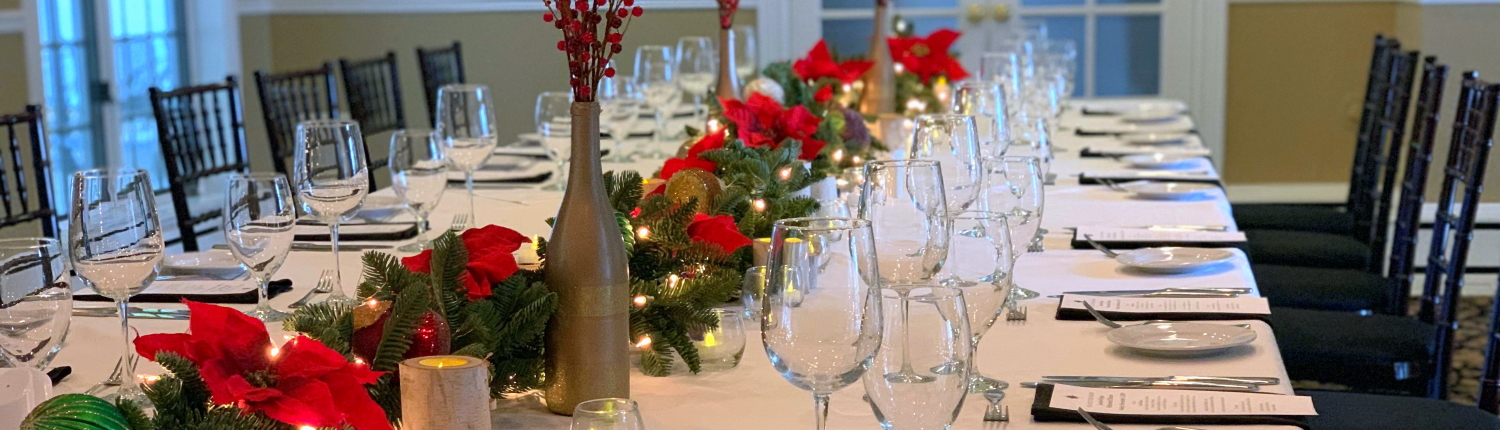 Table set with holiday decor for holiday parties at the Inn at Black Star Farms.