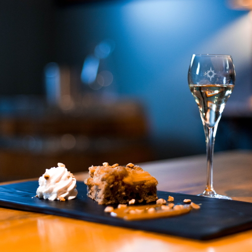 Apple spice cake with a glass of our Sirius Maple Dessert Wine.