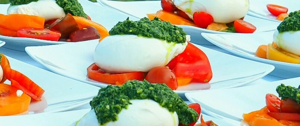 Tomato Burrata Salads topped with pesto from our Arcturos Dining Series