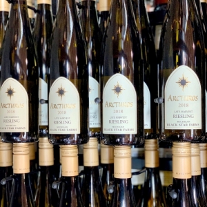 Bottles of 2018 Arcturos Late Harvest Riesling in the tasting room at Black Star Farms Suttons Bay.