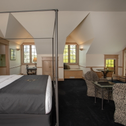 The spacious Diadem room at the Inn at Black Star Farms with sitting area.