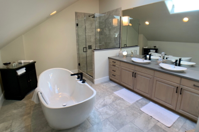 Bathroom in Atlas with large soaking tub and walk-in shower.