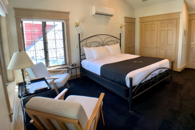 Atlas room with king bed and sitting area.