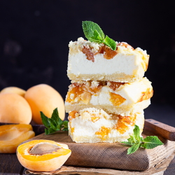 Example of apricot cheesecake with fresh mint garnish.