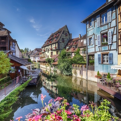 Canal with colorful buildings in Strasbourg, France.