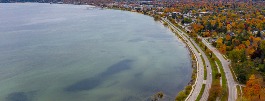 aerial views of Traverse City in the fall with gorgeous fall colors in Michigan - one of the best things to do in Traverse City