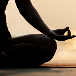 Woman in meditation yoga pose.