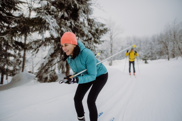 A couple enjoying cross country skiing and other romantic things to do in Traverse City this winter