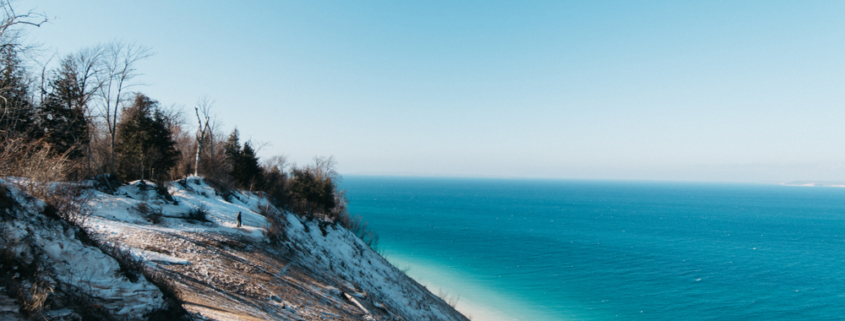 Gorgeous winter scenery of Lake Michigan at Sleeping Bear Dunes - one of the best things to do in Traverse City in the winter