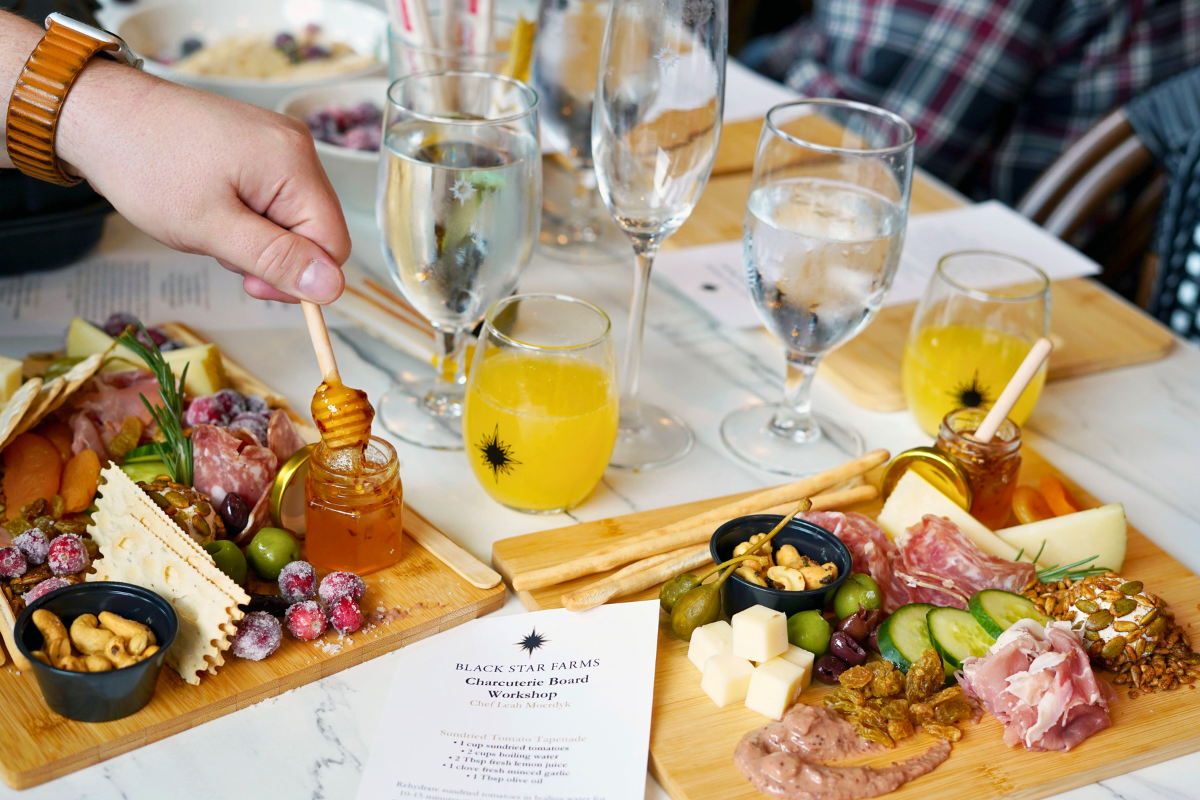 Two charcuterie boards and two mimosas from a past workshop.