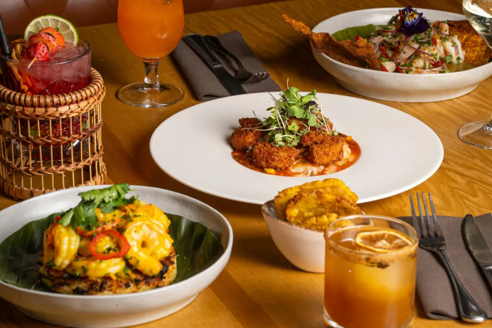 An array of cocktails and food that reflect the spirit of our cocktail pairing dinner