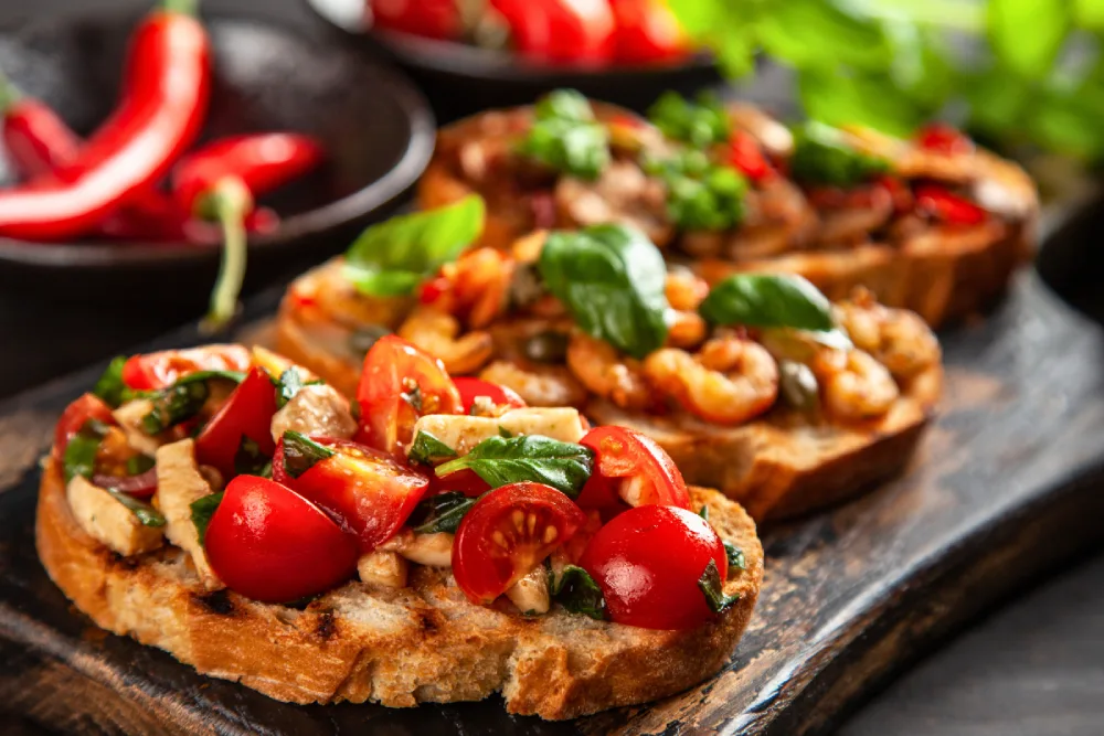 Bruschetta with fresh toppings including tomato and basil